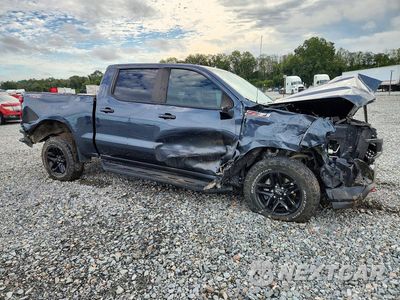 Czwarte zdjęcie samochodu z boku: 2021 CHEVROLET SILVERADO K1500 LT TRAIL BOSS VIN:1GCPYFED9MZ243569 - miniatura