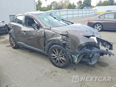 Czwarte zdjęcie samochodu z boku: 2017 MAZDA CX-3 TOURING VIN:JM1DKDC74H0150832 - miniatura