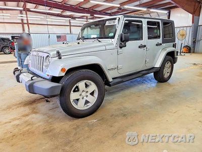 2010 JEEP WRANGLER UNLIMITED SAHARA 1J4HA5H11AL221028 - główne zdjęcie licytacji z USA - miniatura