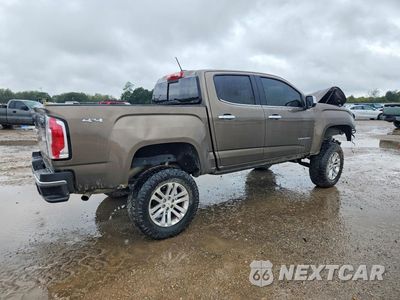 Trzecie zdjęcie samochodu z tyłu: 2016 GMC CANYON SLT VIN:1GTG6DE3XG1348822 - miniatura