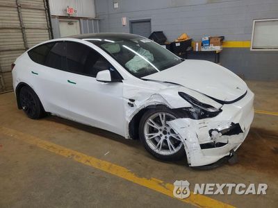 Czwarte zdjęcie samochodu z boku: 2021 TESLA MODEL Y VIN:5YJYGDEE0MF131642 - miniatura