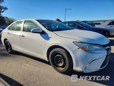 Czwarte zdjęcie samochodu z boku: 2015 TOYOTA CAMRY HYBRID LE VIN:4T1BD1FK6FU149778 - miniatura