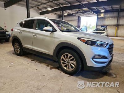 Czwarte zdjęcie samochodu z boku: 2016 HYUNDAI TUCSON SE VIN:KM8J33A41GU107913 - miniatura