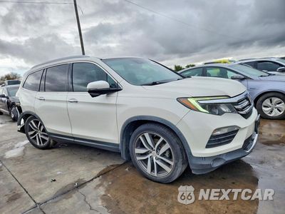 Czwarte zdjęcie samochodu z boku: 2016 HONDA PILOT TOURING VIN:5FNYF5H9XGB021760 - miniatura