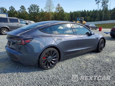 Trzecie zdjęcie samochodu z tyłu: 2023 TESLA MODEL 3 VIN:5YJ3E1EC0PF587965 - miniatura