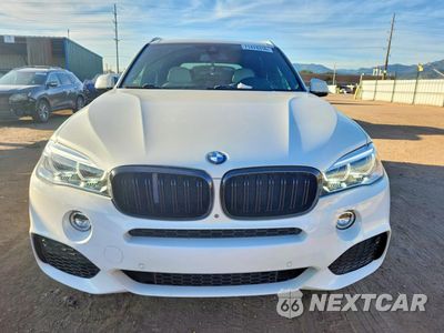 Piąte zdjęcie samochodu w środku: 2018 BMW X5 XDRIVE50I VIN:5UXKR6C5XJ0U14069 - miniatura