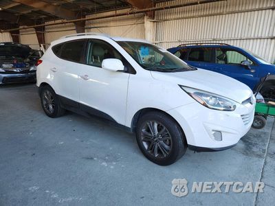 Czwarte zdjęcie samochodu z boku: 2015 HYUNDAI TUCSON SE VIN:KM8JU3AG9FU116915 - miniatura