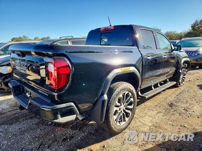 Trzecie zdjęcie samochodu z tyłu: 2023 GMC CANYON DENALI VIN:1GTP6FEK6P1198842 - miniatura