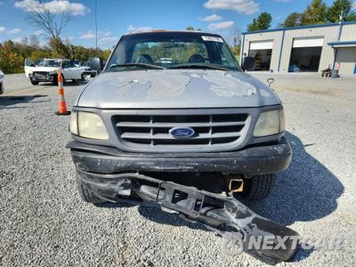 Piąte zdjęcie samochodu w środku: 2001 FORD F-150 VIN:1FTRF18W41NB26421 - miniatura