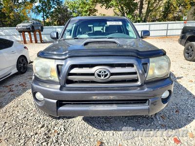 Piąte zdjęcie samochodu w środku: 2010 TOYOTA TACOMA V6 VIN:3TMLU4EN5AM055782 - miniatura