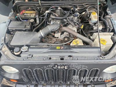 Zdjęcie 11 z 12 samochodu: 2010 JEEP WRANGLER SPORT VIN:1J4AA2D11AL124482 - miniatura