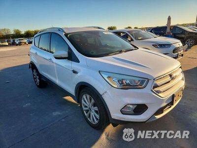 Czwarte zdjęcie samochodu z boku: 2017 FORD ESCAPE TITANIUM VIN:1FMCU9J92HUD21296 - miniatura