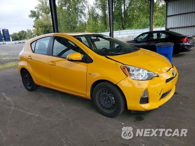 Czwarte zdjęcie samochodu z boku: 2014 TOYOTA PRIUS C TWO VIN:JTDKDTB31E1060571 - miniatura
