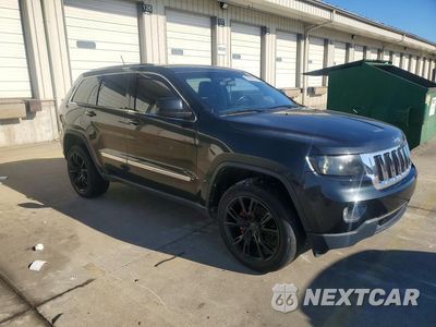 Czwarte zdjęcie samochodu z boku: 2013 JEEP GRAND CHEROKEE LAREDO VIN:1C4RJEAG2DC597654 - miniatura