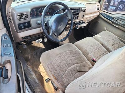 Zdjęcie 8 z 12 samochodu: 1999 FORD F250 SUPER DUTY VIN:1FTNX20F8XEB64871 - miniatura