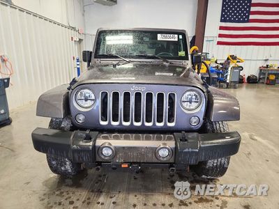 Piąte zdjęcie samochodu w środku: 2016 JEEP WRANGLER SAHARA VIN:1C4AJWBG4GL203559 - miniatura