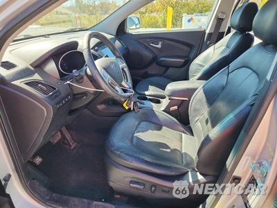 Zdjęcie 7 z 14 samochodu: 2012 HYUNDAI TUCSON LIMITED VIN:KM8JUCAC0CU509808 - miniatura