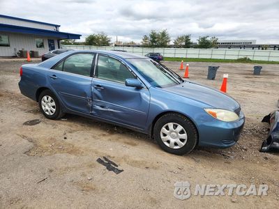 Czwarte zdjęcie samochodu z boku: 2002 TOYOTA CAMRY LE VIN:4T1BE32K82U528533 - miniatura