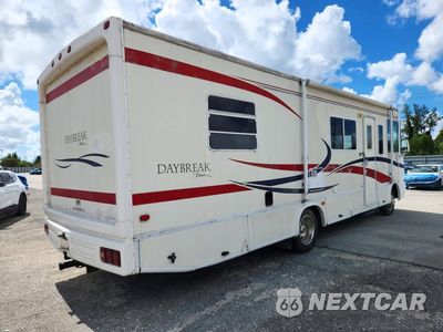 Czwarte zdjęcie samochodu z boku: 2001 FORD F550 SUPER - CAMPER VIN:1FCLF53SX10A14043 - miniatura