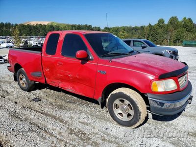 Czwarte zdjęcie samochodu z boku: 2001 FORD F150 VIN:2FTZX07291CA87868 - miniatura