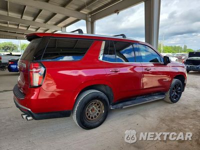 Trzecie zdjęcie samochodu z tyłu: 2021 CHEVROLET TAHOE C1500 PREMIER VIN:1GNSCSKD2MR138272 - miniatura
