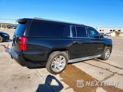 Trzecie zdjęcie samochodu z tyłu: 2016 CHEVROLET SUBURBAN C1500 LTZ VIN:1GNSCJKC1GR109867 - miniatura