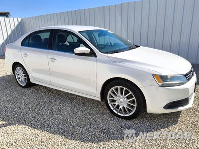 Czwarte zdjęcie samochodu z boku: 2013 VOLKSWAGEN JETTA SE VIN:3VWDP7AJ4DM404500 - miniatura