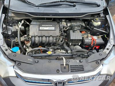 Zdjęcie 11 z 12 samochodu: 2014 HONDA INSIGHT EX VIN:JHMZE2H77ES000514 - miniatura