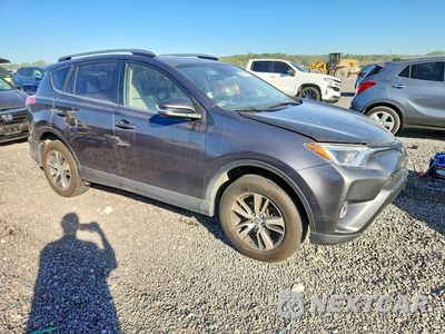 Czwarte zdjęcie samochodu z boku: 2018 TOYOTA RAV4 XLE VIN:JTMRFREV8JJ241315 - miniatura