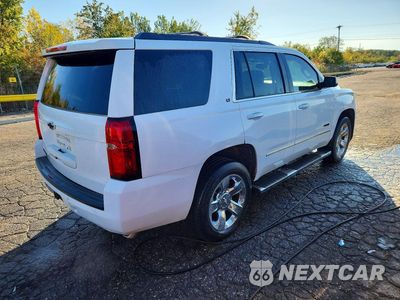 Trzecie zdjęcie samochodu z tyłu: 2019 CHEVROLET TAHOE K1500 LT VIN:1GNSKBKC5KR101014 - miniatura