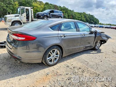 Trzecie zdjęcie samochodu z tyłu: 2018 FORD FUSION SE HYBRID VIN:3FA6P0LUXJR153321 - miniatura