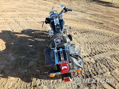 Czwarte zdjęcie samochodu z boku: 2003 HARLEY-DAVIDSON FLSTCI VIN:1HD1BWB1X3Y044048 - miniatura
