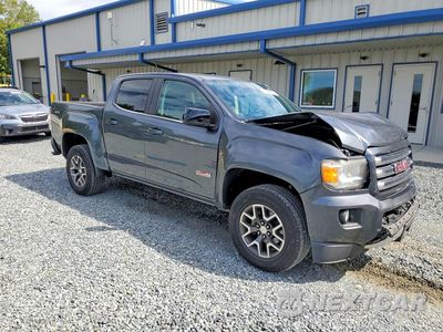 Czwarte zdjęcie samochodu z boku: 2016 GMC CANYON SLE VIN:1GTG6CE31G1370122 - miniatura
