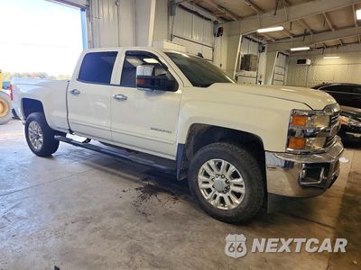 Czwarte zdjęcie samochodu z boku: 2016 CHEVROLET SILVERADO K2500 HEAVY DUTY LT VIN:1GC1KVEG7GF287801 - miniatura