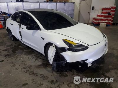 Czwarte zdjęcie samochodu z boku: 2023 TESLA MODEL 3 VIN:5YJ3E1EA7PF671344 - miniatura