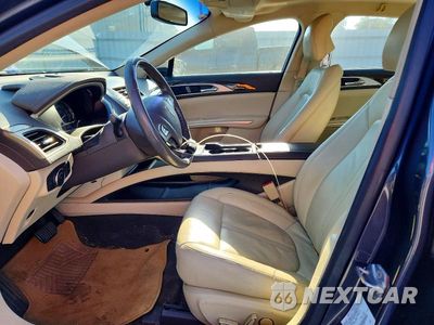 Zdjęcie 7 z 12 samochodu: 2013 LINCOLN MKZ HYBRID VIN:3LN6L2LU0DR801119 - miniatura