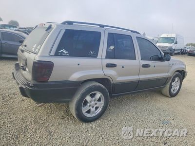 Trzecie zdjęcie samochodu z tyłu: 2002 JEEP GRAND CHEROKEE SPORT VIN:1J4GW38SX2C182175 - miniatura
