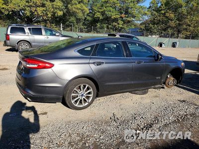 Trzecie zdjęcie samochodu z tyłu: 2017 FORD FUSION SE PHEV VIN:3FA6P0PU9HR160765 - miniatura