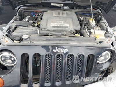 Zdjęcie 11 z 12 samochodu: 2012 JEEP WRANGLER UNLIMITED SAHARA VIN:1C4BJWEG1CL277953 - miniatura