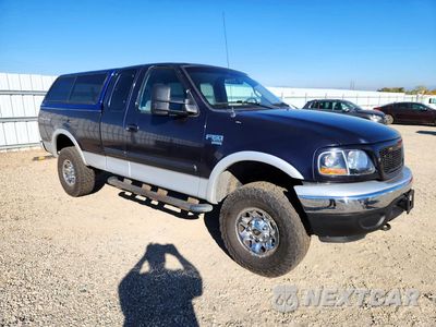 Czwarte zdjęcie samochodu z boku: 2001 FORD F150 VIN:2FTPX18L01CB00866 - miniatura