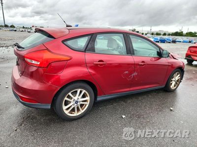 Trzecie zdjęcie samochodu z tyłu: 2016 FORD FOCUS SE VIN:1FADP3K2XGL350313 - miniatura