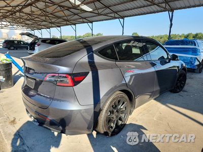Trzecie zdjęcie samochodu z tyłu: 2023 TESLA MODEL Y VIN:7SAYGAEEXPF613914 - miniatura