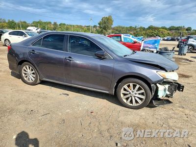 Czwarte zdjęcie samochodu z boku: 2014 TOYOTA CAMRY XLE VIN:4T4BF1FK9ER386392 - miniatura