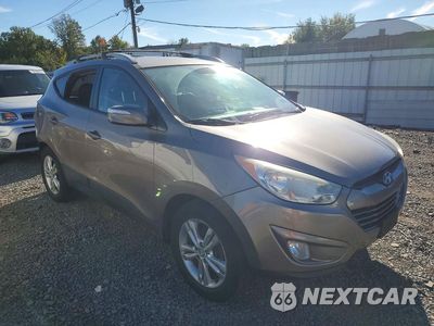 Czwarte zdjęcie samochodu z boku: 2013 HYUNDAI TUCSON GLS VIN:KM8JUCAC3DU618619 - miniatura