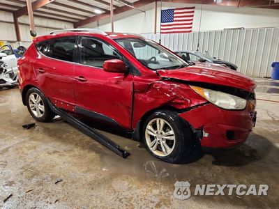 Czwarte zdjęcie samochodu z boku: 2010 HYUNDAI TUCSON GLS VIN:KM8JU3AC5AU073826 - miniatura