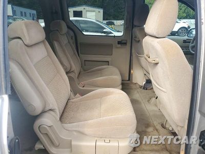 Zdjęcie 11 z 13 samochodu: 2005 FORD FREESTAR SEL VIN:2FMZA52265BA92586 - miniatura