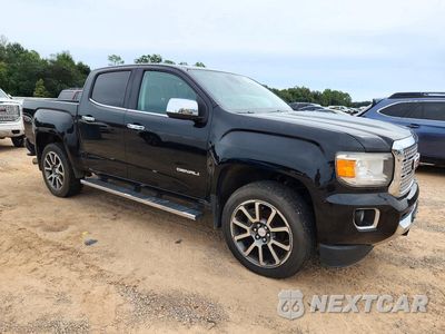 Czwarte zdjęcie samochodu z boku: 2018 GMC CANYON DENALI VIN:1GTP6EE17J1118506 - miniatura