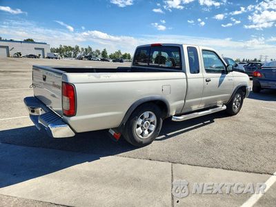 Trzecie zdjęcie samochodu z tyłu: 1999 NISSAN FRONTIER XE VIN:1N6DD26S4XC324021 - miniatura