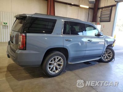 Trzecie zdjęcie samochodu z tyłu: 2015 GMC YUKON SLE VIN:1GKS1AKC8FR730122 - miniatura
