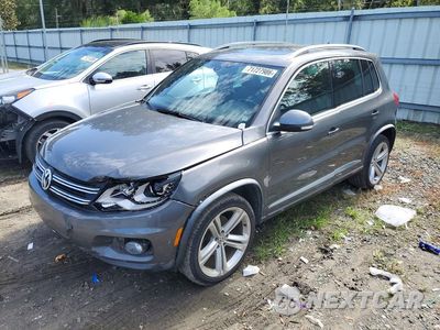 2014 VOLKSWAGEN TIGUAN S WVGAV3AX9EW033839 - główne zdjęcie licytacji z USA - miniatura